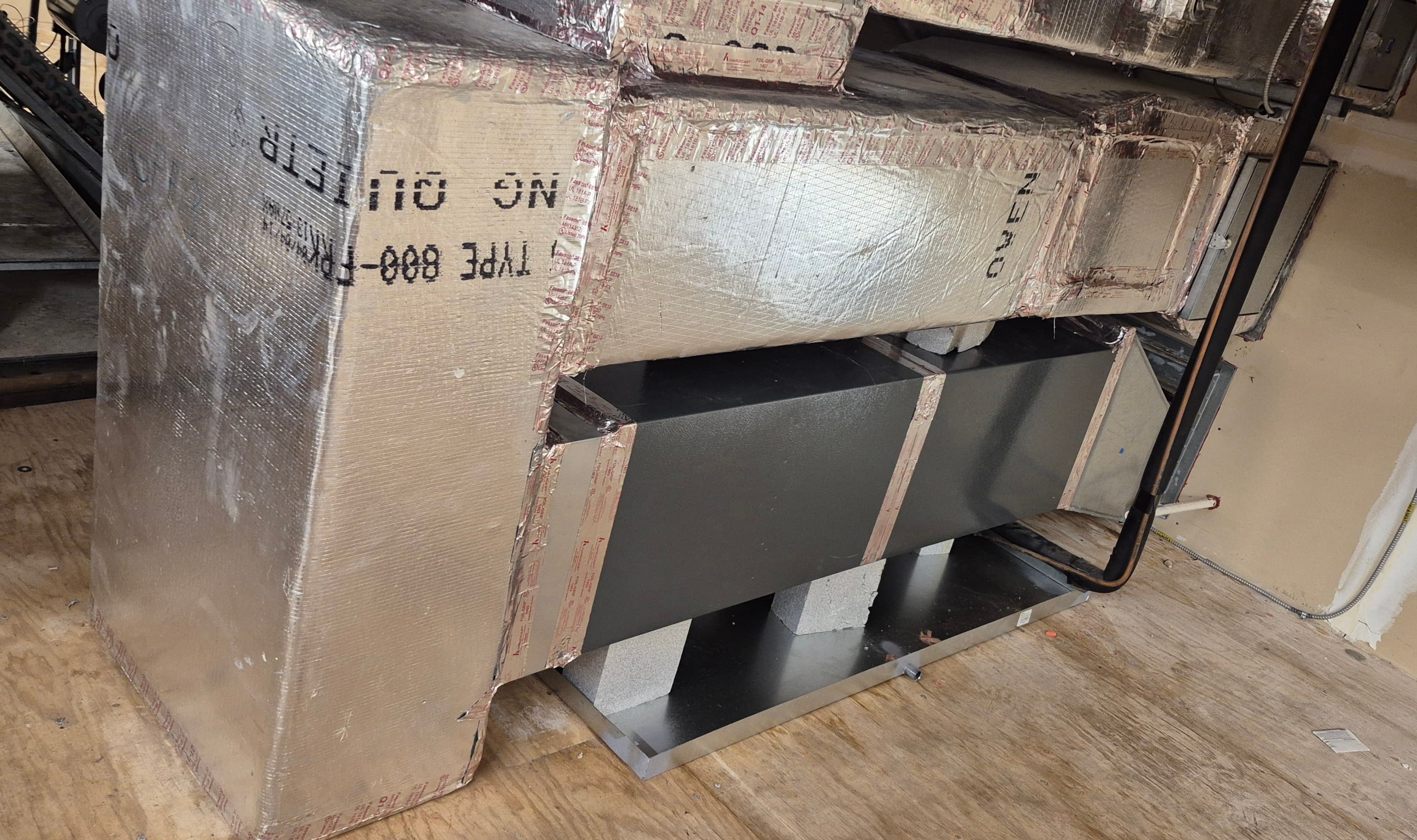 Gas furnace and evaporator coil installed and connected to ductwork