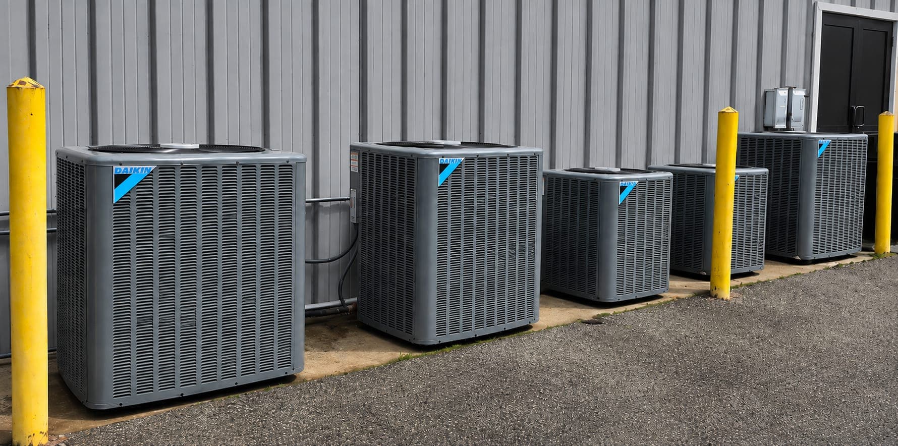 Row of newly installed air conditioning condensing units by ProPoint HVAC in Mobile, Alabama