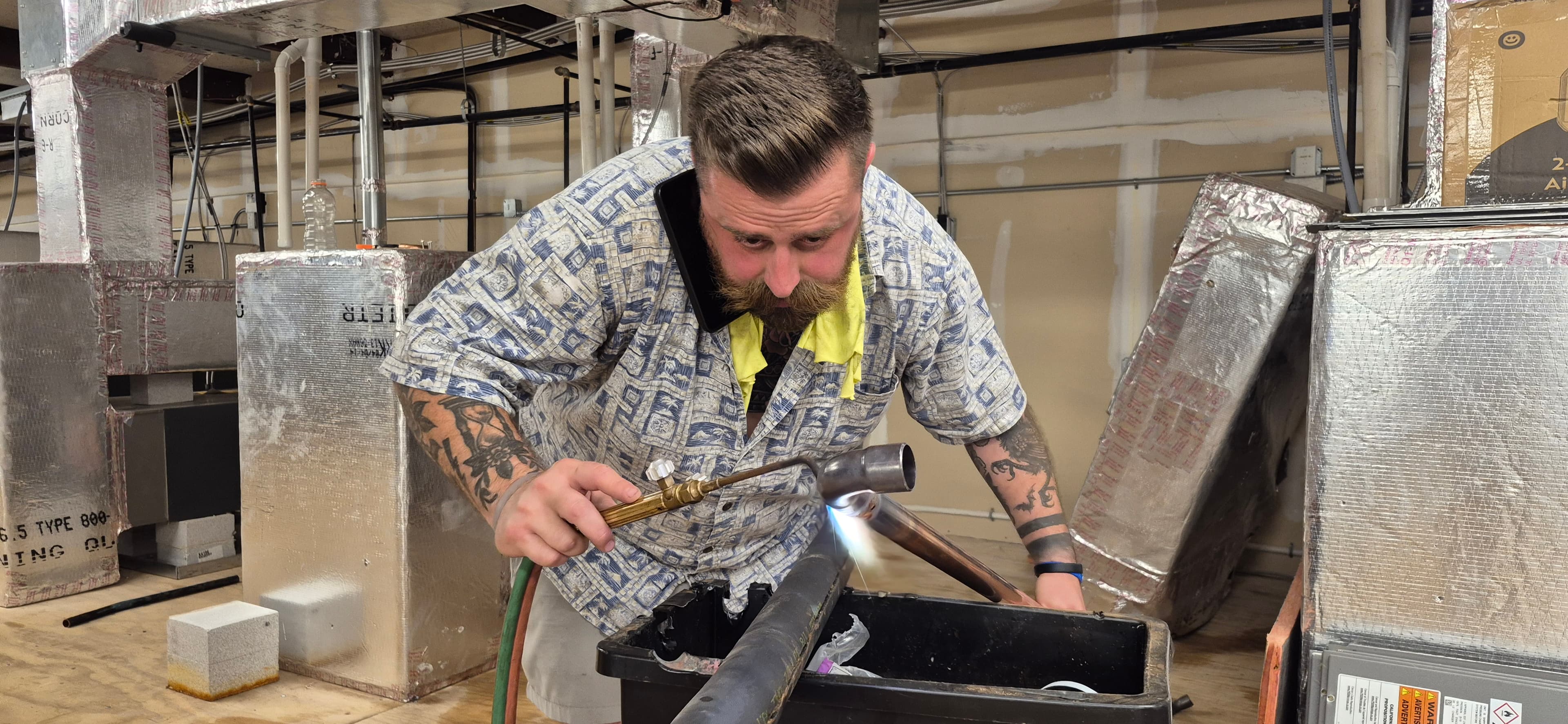 ProPoint HVAC technician brazing a copper line set